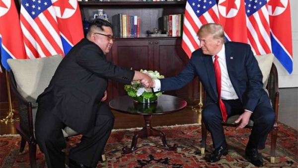 Con un apretón de manos, Trump y Kim dieron comienzo a una cumbre histórica