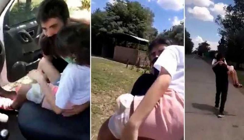 VIDEO Con su hija enferma en brazos, cruzó el límite a pie porque no les permitían ingresar